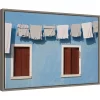 23" X 16" Hanging Laundry Along Wall By Brenda Tharp Danita Delimont Framed Canvas Wall Art Blue - Amanti Art